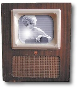 Hey, darling, do something about that TV set! The image's fluttering, dammit!