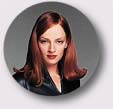Mrs Peel with her hair dressed á la Brylcream...